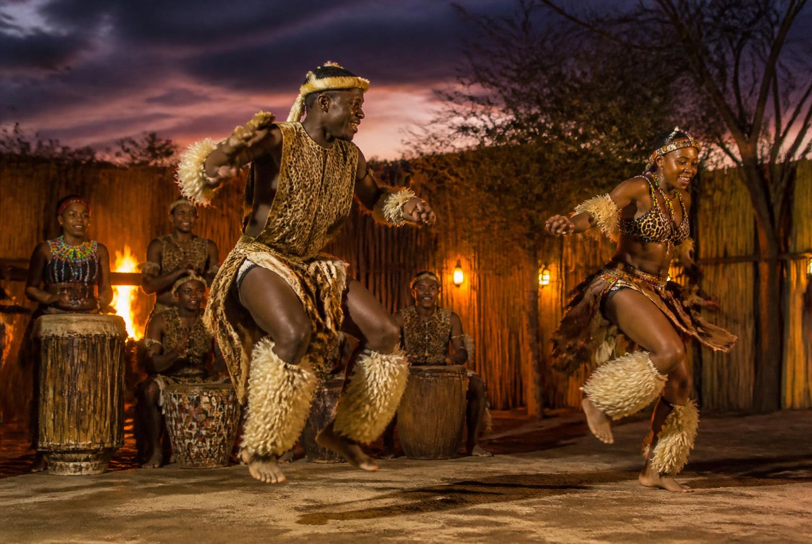 Traditional dancers and drummers performing